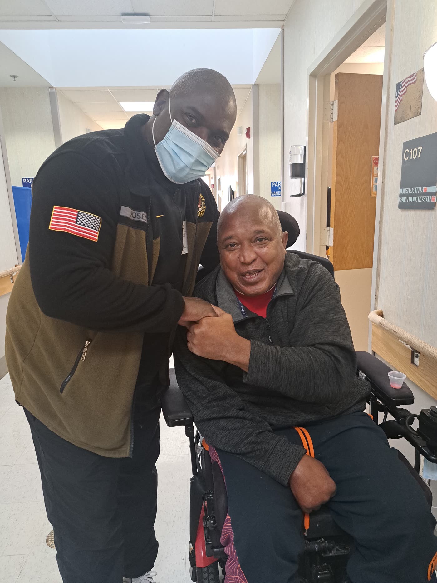 Larry Posey visiting a veteran