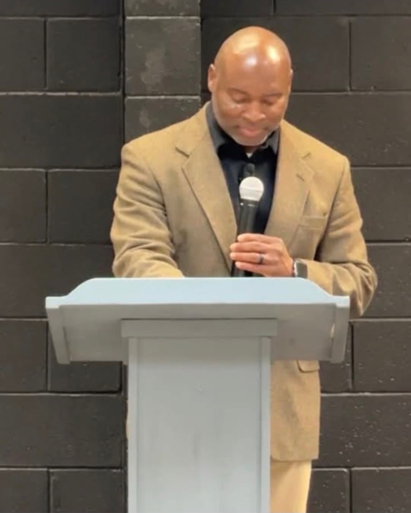 Larry Posey speaking at a PrayerLine Warriors gathering